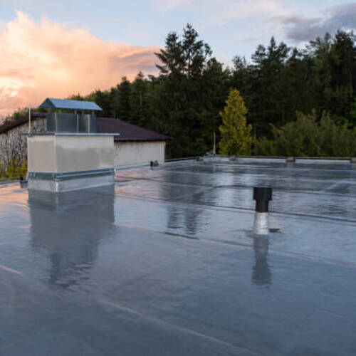 a  commercial roof with a newly applied roof coating